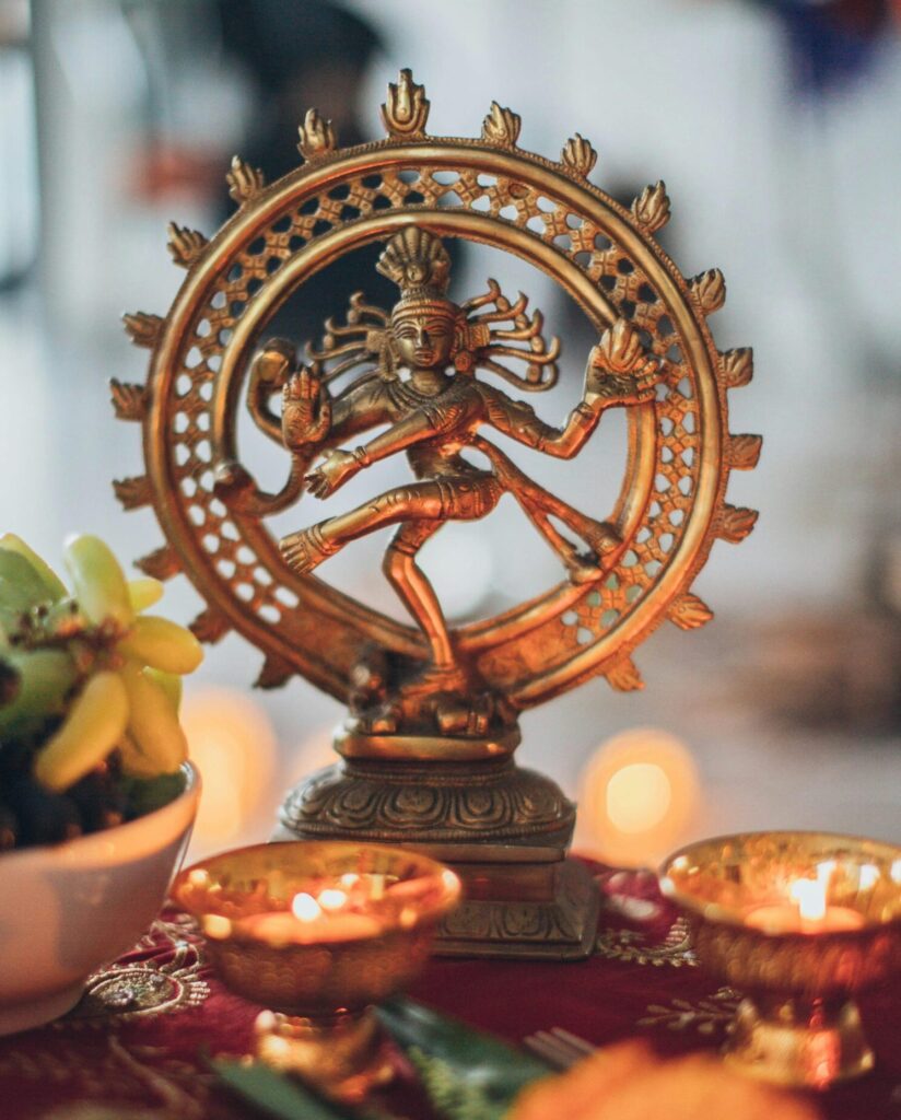 Shiva Nataraja Figurine Surrounded by Lighted Tealights